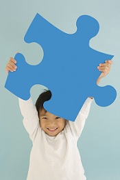 boy with puzzle piece